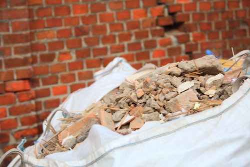Construction site with visible waste materials in Charlton