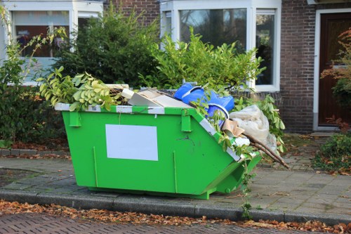 Team setting up a skip at a residential site